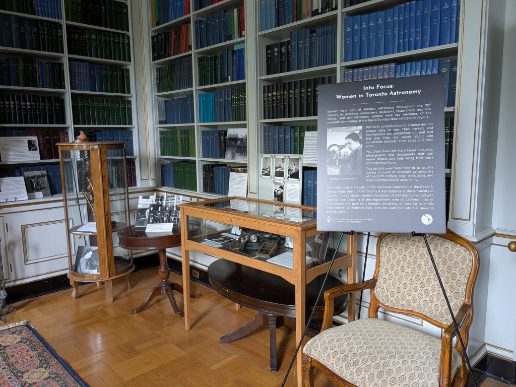 Part of an exhibit in a historic library. Artifacts are displayed in